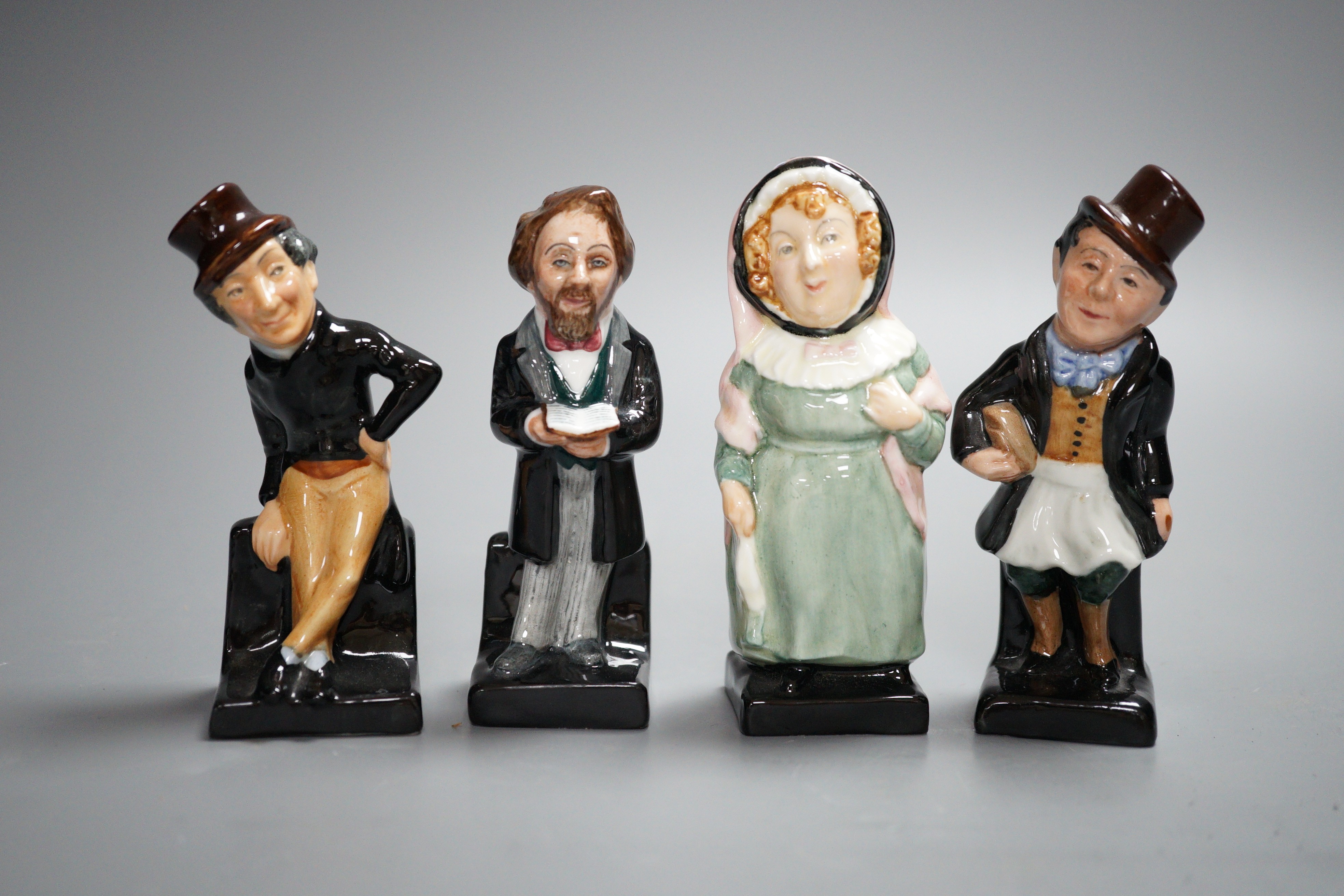 A group of twenty five Royal Doulton Dickens characters